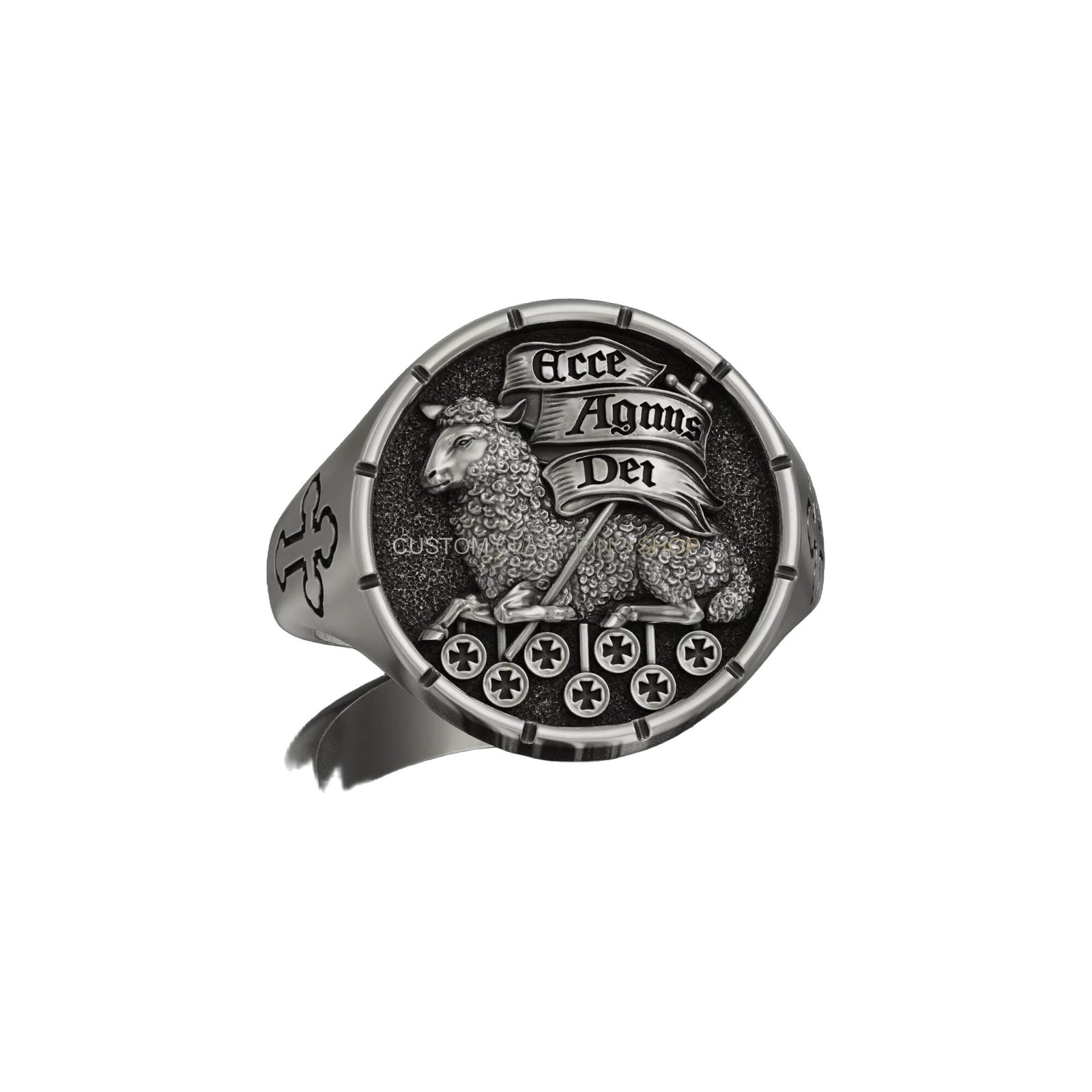 Sterling silver agnus dei signet ring, angled three-quarter view showing engraved cross shoulder
