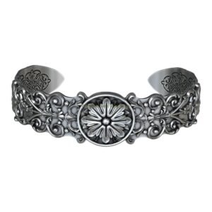 Sterling silver filigree cuff bracelet with central daisy medallion and ornate scrollwork