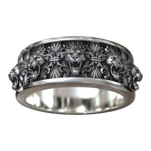 Gothic sterling silver lion head ring with baroque ornamental design