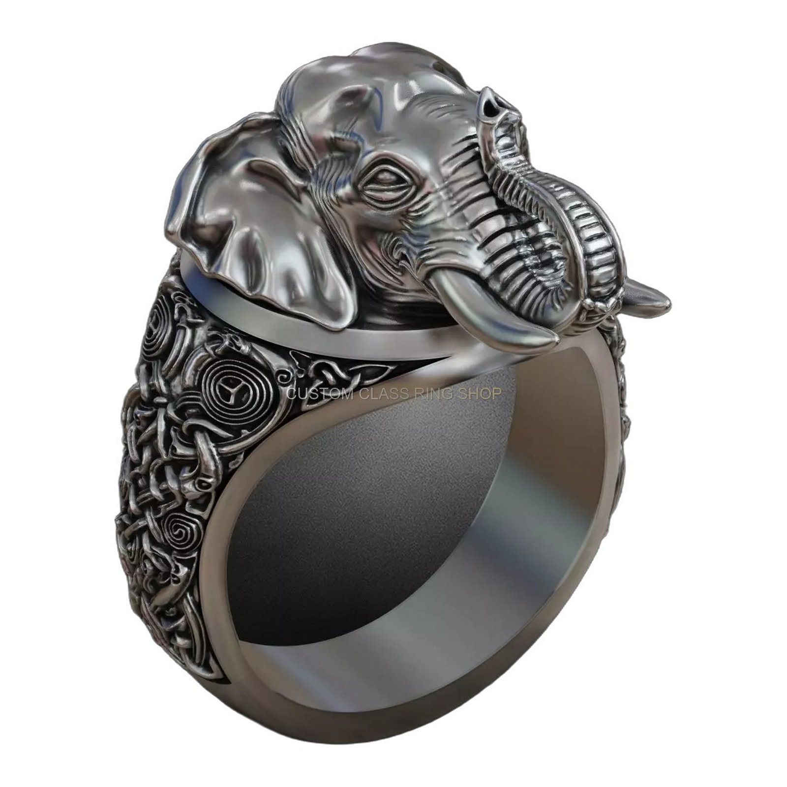 Sterling silver elephant head statement ring, angled three-quarter view showing engravings