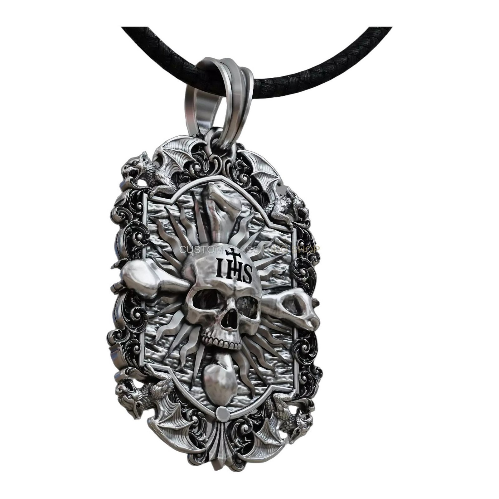Gothic sterling silver skull pendant, side profile view