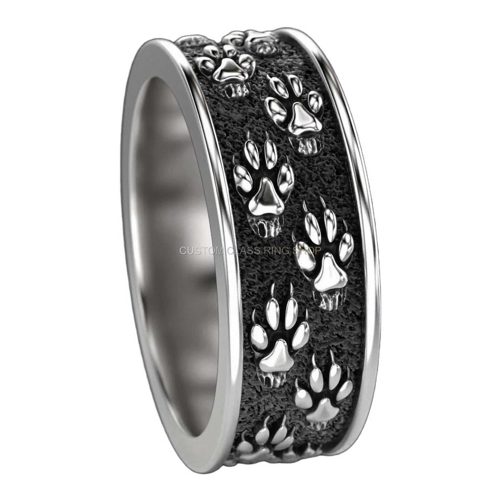 Sterling silver paw print statement ring, left side profile view