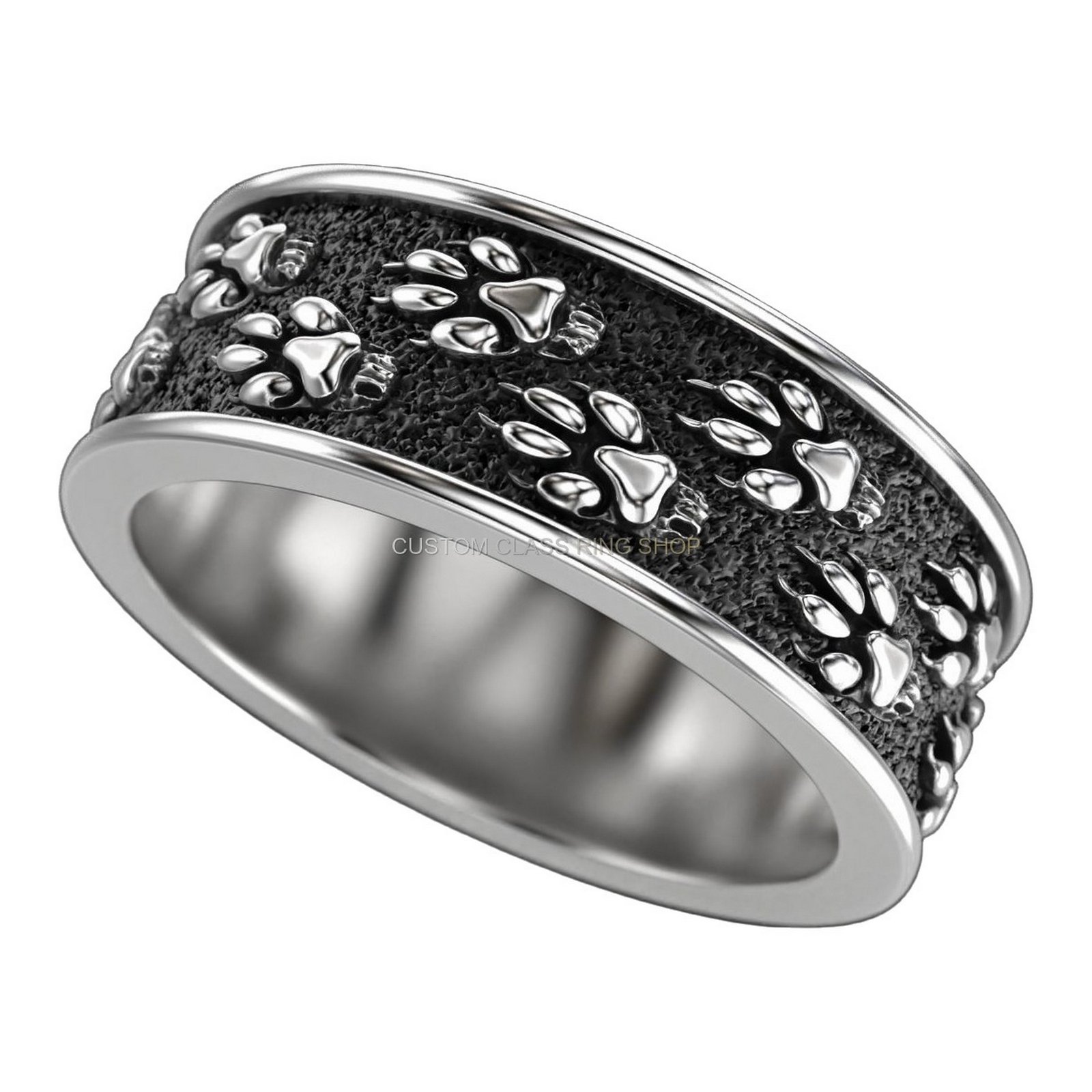 Sterling silver paw print statement ring, front three-quarter perspective