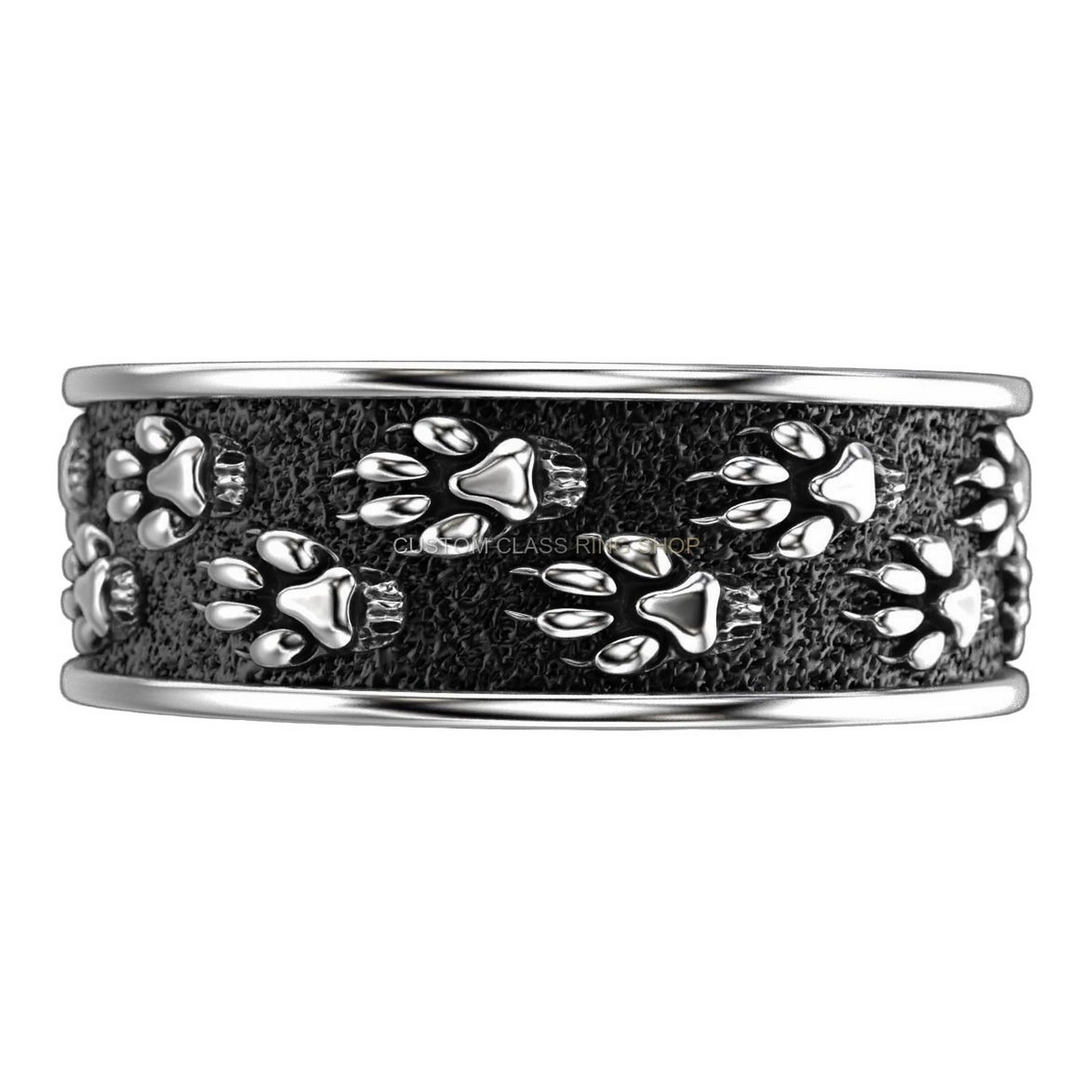 Sterling silver paw print statement ring, top-down detail view