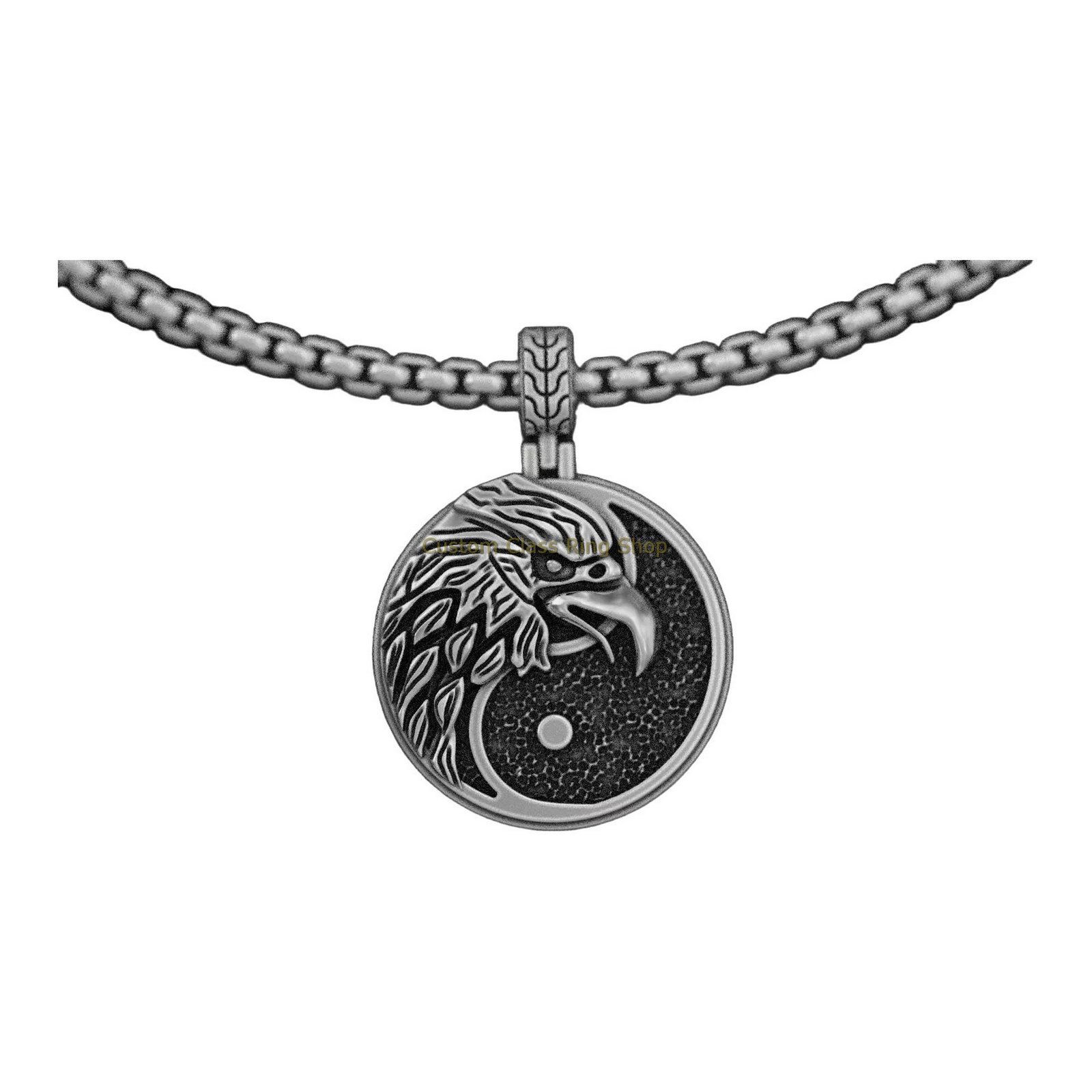 Sterling silver eagle yin yang pendant, closeup angled detail view