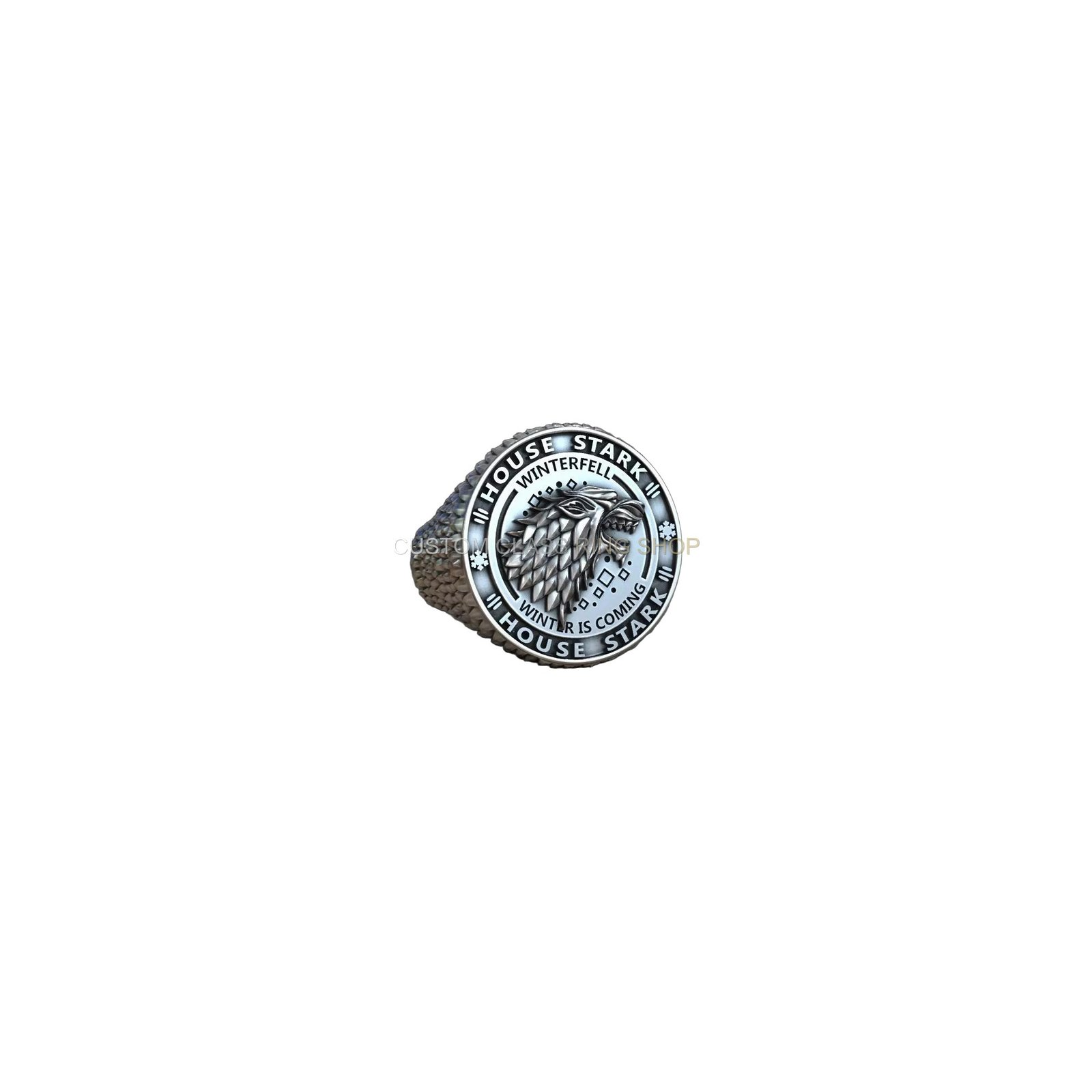 Sterling silver house stark signet ring, angled side-profile view