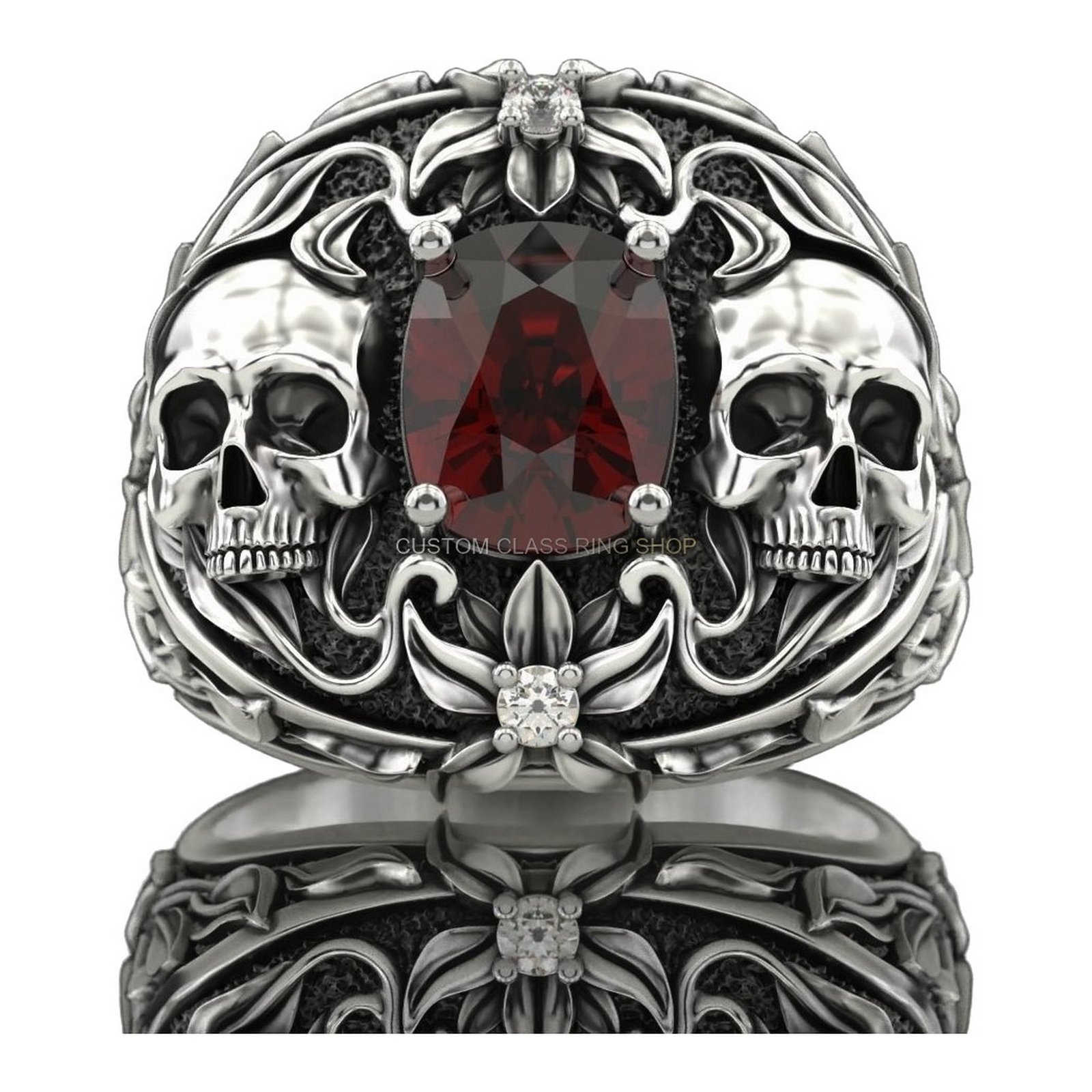 Mens oxidized silver dual skull ring with garnet center and filigree border