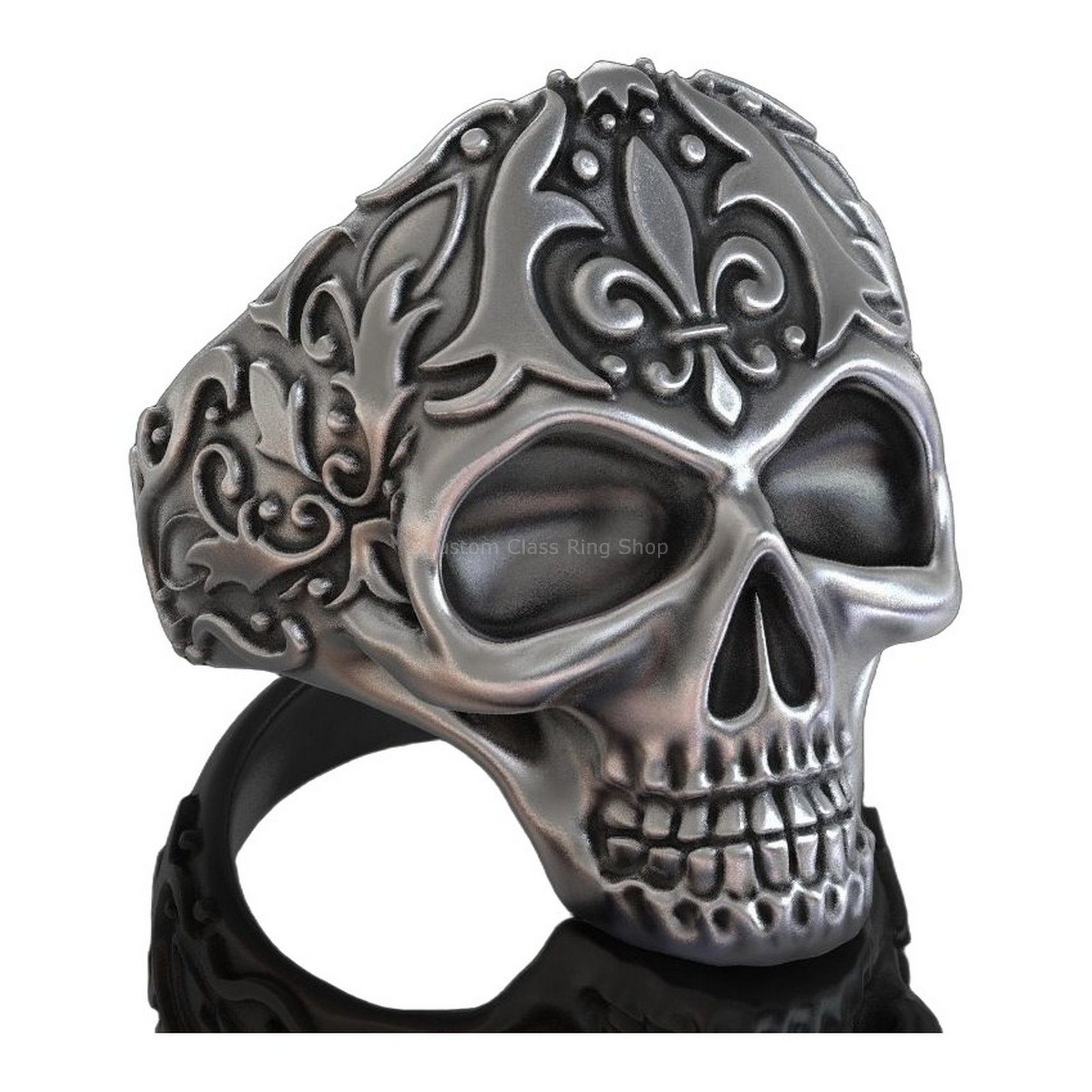Sterling silver skull statement ring, three-quarter front angle