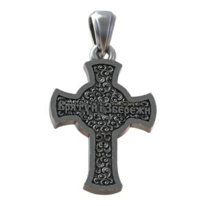 Sterling silver jesus cross pendant with filigree scrollwork and relief face