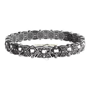 Sterling silver vintage skull bracelet with oxidized filigree detailing