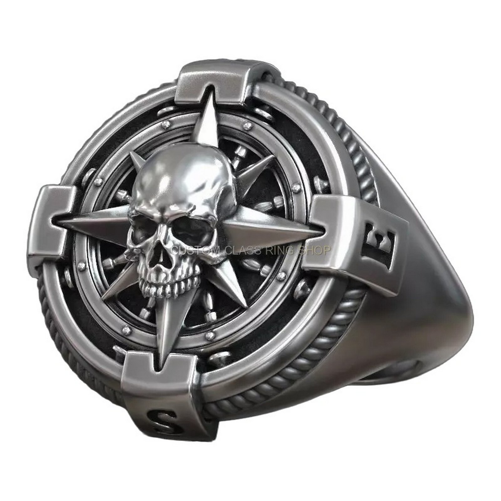 Sterling silver windrose compass skull signet ring, angled three-quarter perspective